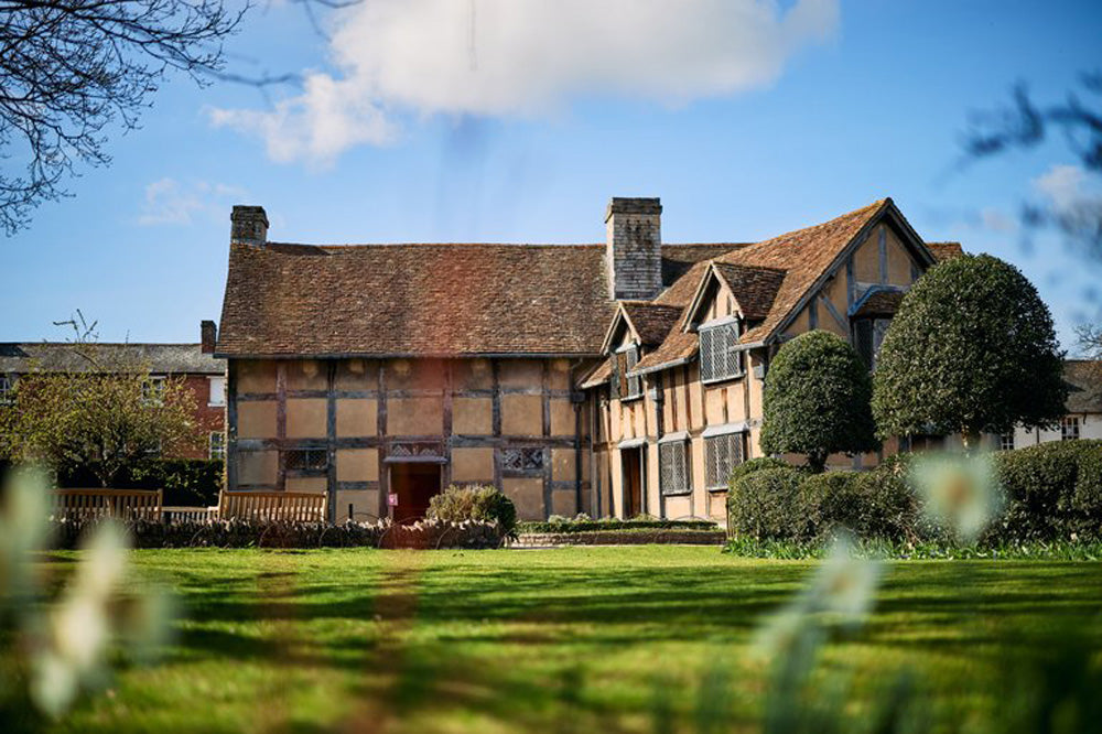 Shakespeare’s Birthplace on Henley Street in Stratford-upon-Avon is a restored 16th-century half-timbered house where William Shakespeare was likely born in 1564 and raised. It is a two-story building featuring a parlor with a fireplace, a large kitchen with an open hearth, and a dedicated glove-maker’s workshop, reflecting the family's status.