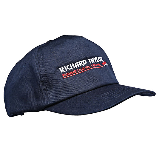 A navy blue baseball cap with embroidered white and red text reading 'RICHARD TAYLOR TRAVEL FARMING | BAILING | TRAVEL' on the front panel, shown on a plain white background.