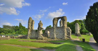 Founded in 1020, the Abbey of St Edmund in Bury St Edmunds was one of medieval England’s wealthiest and most powerful Benedictine monasteries. It was a major pilgrimage site housing the relics of martyred King Edmund. Today, its extensive ruins, including the 14th-century Abbey Gate and Norman Tower, lie within the Abbey Gardens
