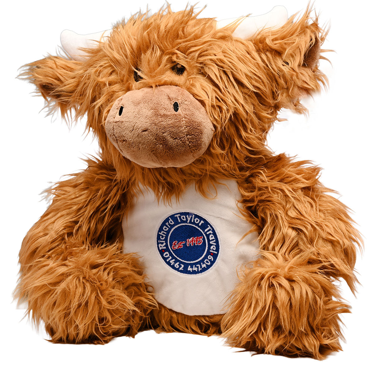Charlie Arthur a shaggy Highland cow plush toy with a white belly patch featuring a blue and red 'Richard Taylor Travel  Est 1995' logo, set against a plain white background.