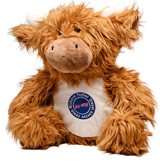 Charlie Arthur a shaggy Highland cow plush toy with a white belly patch featuring a blue and red 'Richard Taylor Travel  Est 1995' logo, set against a plain white background.