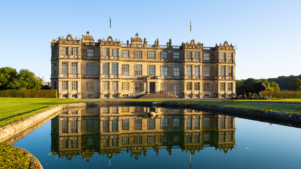 Longleat House, located in Wiltshire, England, is a premier example of Elizabethan "prodigy" architecture, built between 1568 and 1580 for Sir John Thynne. Famous for its symmetrical facade, grand interiors, and 900-acre landscaped parkland by Capability Brown, it was the first stately home open to the public (1949) and home to the first drive-thru safari park outside Africa (1966).