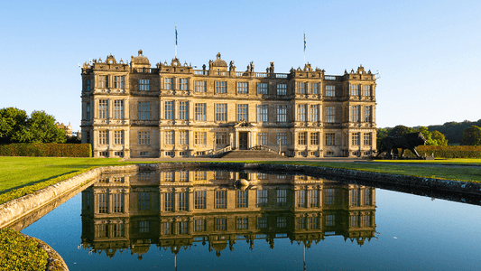 Longleat House, located in Wiltshire, England, is a premier example of Elizabethan "prodigy" architecture, built between 1568 and 1580 for Sir John Thynne. Famous for its symmetrical facade, grand interiors, and 900-acre landscaped parkland by Capability Brown, it was the first stately home open to the public (1949) and home to the first drive-thru safari park outside Africa (1966).
