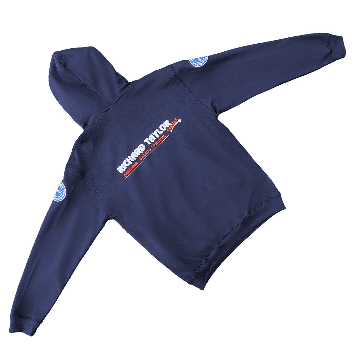 Richard Taylor Travel navy blue hoodie laid flat on a white background, featuring a 'RICHARD TAYLOR TRAVEL' graphic on the rear and circular patches on both sleeves.