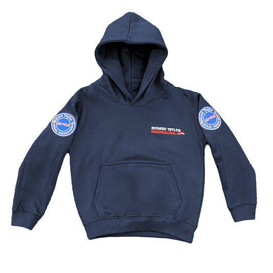 A navy blue hooded childrens sweatshirt/hoodie with a front kangaroo pocket, featuring a 'Richard Taylor Travel' logo on the chest and circular patches on both sleeves, shown against a plain white background.