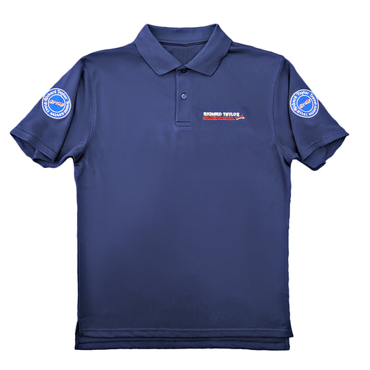 Richard Taylor Travel navy blue short-sleeve polo shirt with a collar and two-button placket. The left chest features a small embroidered logo reading 'RICHARD TAYLOR TRAVEL', and there are circular blue and white logos on both sleeves.