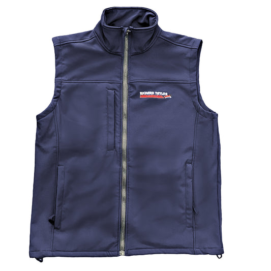 Richard Taylor Travel navy blue softshell vest with a full front zipper, high collar, and a visible 'RICHARD TAYLOR TRAVEL' logo patch on the left chest, shown against a plain white background.