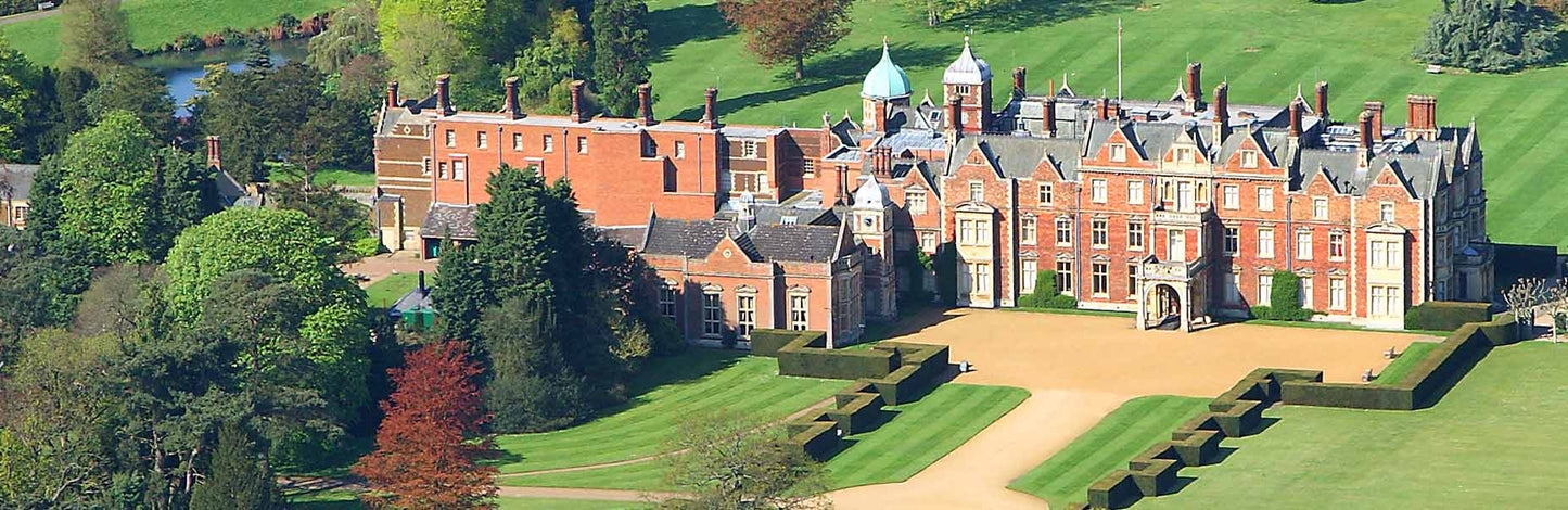 Aerial View of Sandringham. Sandringham Estate is a 20,000-acre Norfolk country estate and private home to British monarchs since 1862. Famed as the Royal Family's Christmas retreat, it features Sandringham House (circa 1870), 60 acres of gardens, the St Mary Magdalene Church, and extensive public woodland. The estate is a working, sustainable landscape within the Norfolk Coast Area of Outstanding Natural Beauty. 