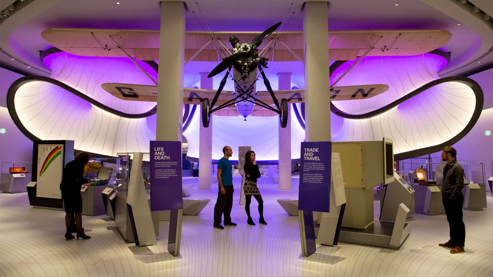 Museum exhibit with a large airplane model and visitors exploring interactive displays at the Science Museum. Located in South Kensington, London, the Science Museum is a world-renowned institution offering free, interactive exploration of science, technology, engineering, and medicine. It features seven stories of educational exhibits, including iconic objects like the Apollo 10 capsule, early steam engines, and the Wonderlab, designed to inspire curiosity in visitors of all ages.