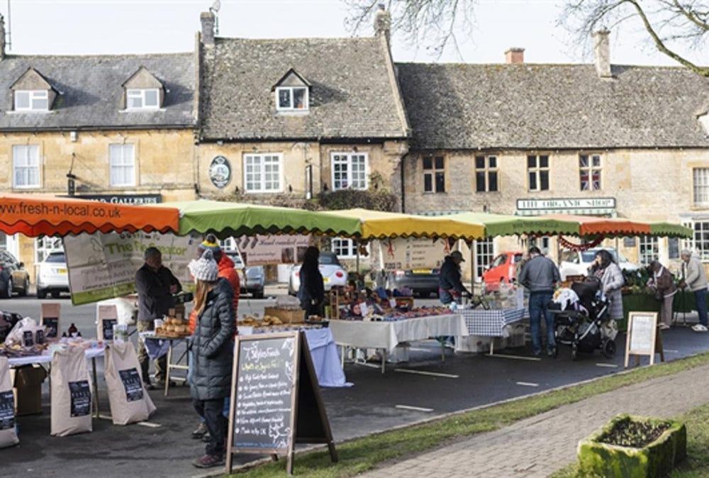 The Stow-on-the-Wold Farmers' Market is a bustling,, high-quality market in the heart of the Cotswolds, held in the historic market square. It offers locally sourced produce including fresh fruit, vegetables, meats, cheeses, artisan bread, and pastries directly from local producers.