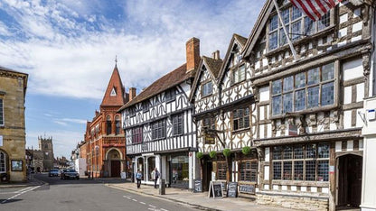 Stratford-upon-Avon town centre is a vibrant, historic Warwickshire market town known as the birthplace of William Shakespeare. It features timber-framed Tudor buildings, the scenic Bancroft Gardens by the River Avon, and attractions like the Royal Shakespeare Theatre. The area combines cultural heritage with shopping, cafes, and markets.
